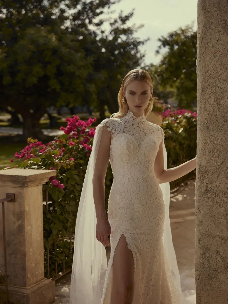 February by Modeca Bridal: Fit & Flare silhouette, high / halter neckline, lace, chapel train
