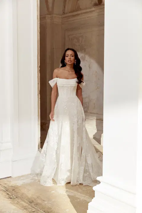 Style 44544 wedding dress by Sincerity Bridal, A-line, organza
