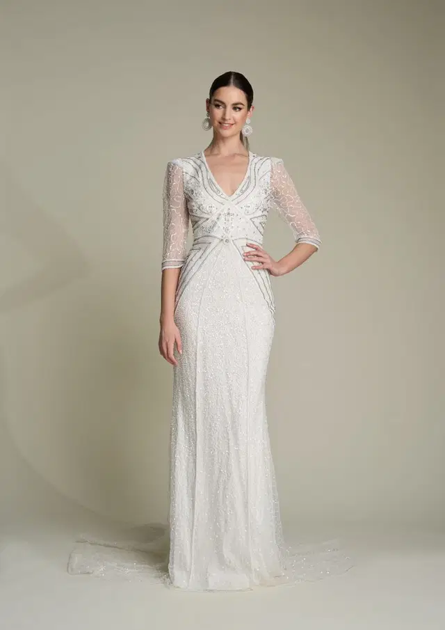 Kayleigh by Eliza Jane Howell: Trumpet silhouette, V-neck neckline, three-quarter sleeves, tulle