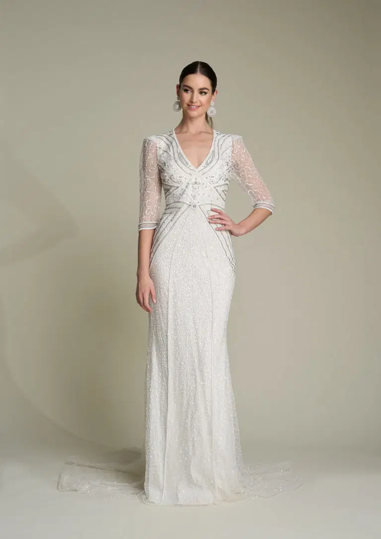 Kayleigh by Eliza Jane Howell: Trumpet silhouette, V-neck neckline, three-quarter sleeves, tulle