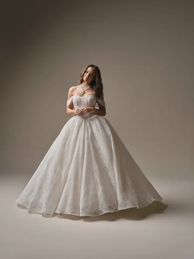 Raquel by Maggie Sottero: Ball Gown silhouette, cat eye neckline, lace