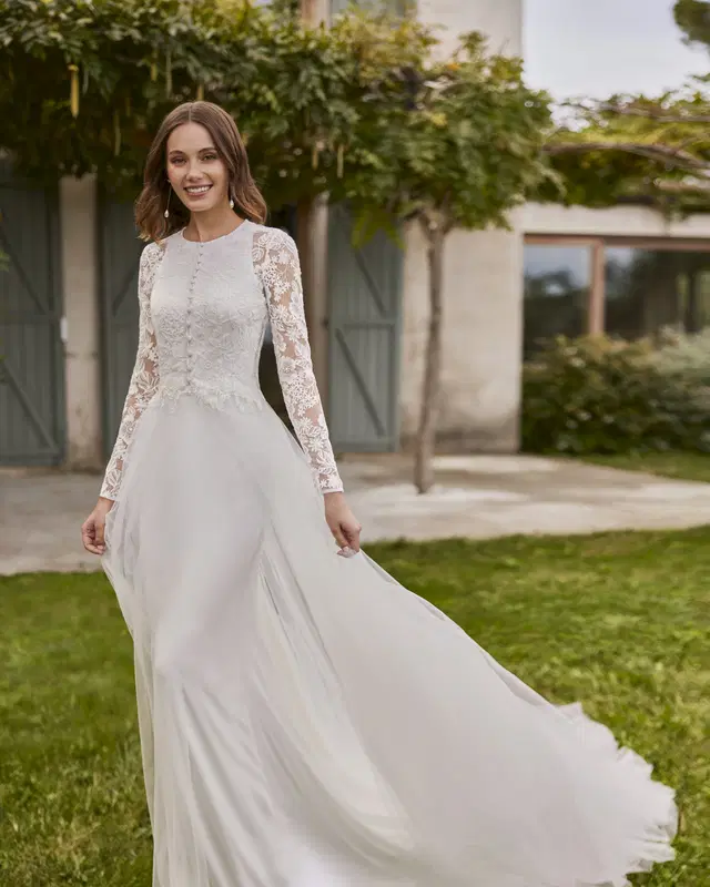 Naitel by Alma Novia: Straight silhouette, high / halter neckline, separate sleeves, crepe