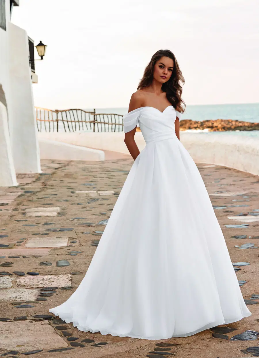 DAISIE by Enzoani: Ball Gown silhouette, off-shoulder neckline, organza