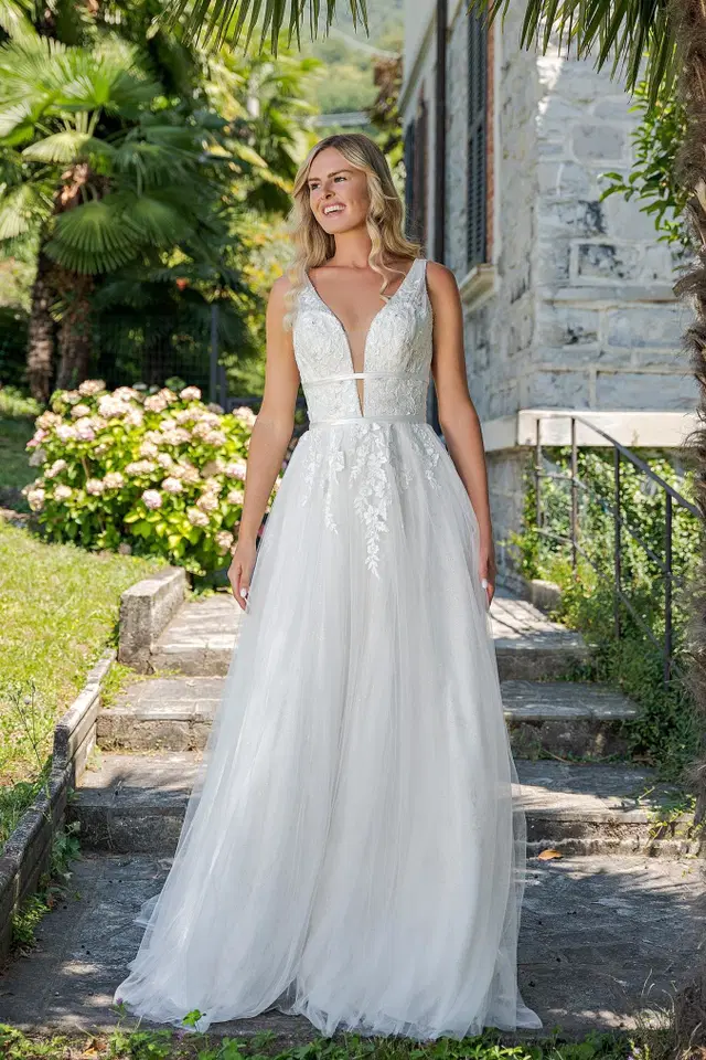 VN17 ivory by Vera Nova: A-Line silhouette, V-neck neckline, sweep / brush train