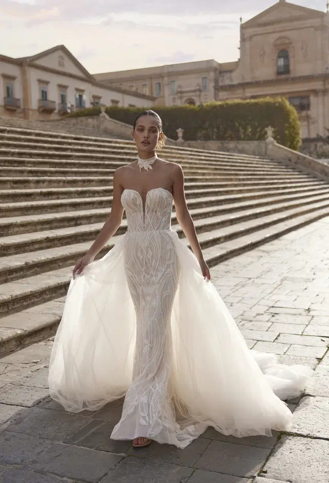 Theodora 25-024 by Ricca Sposa: Mermaid silhouette, deep V-neck neckline, sleeveless, lace