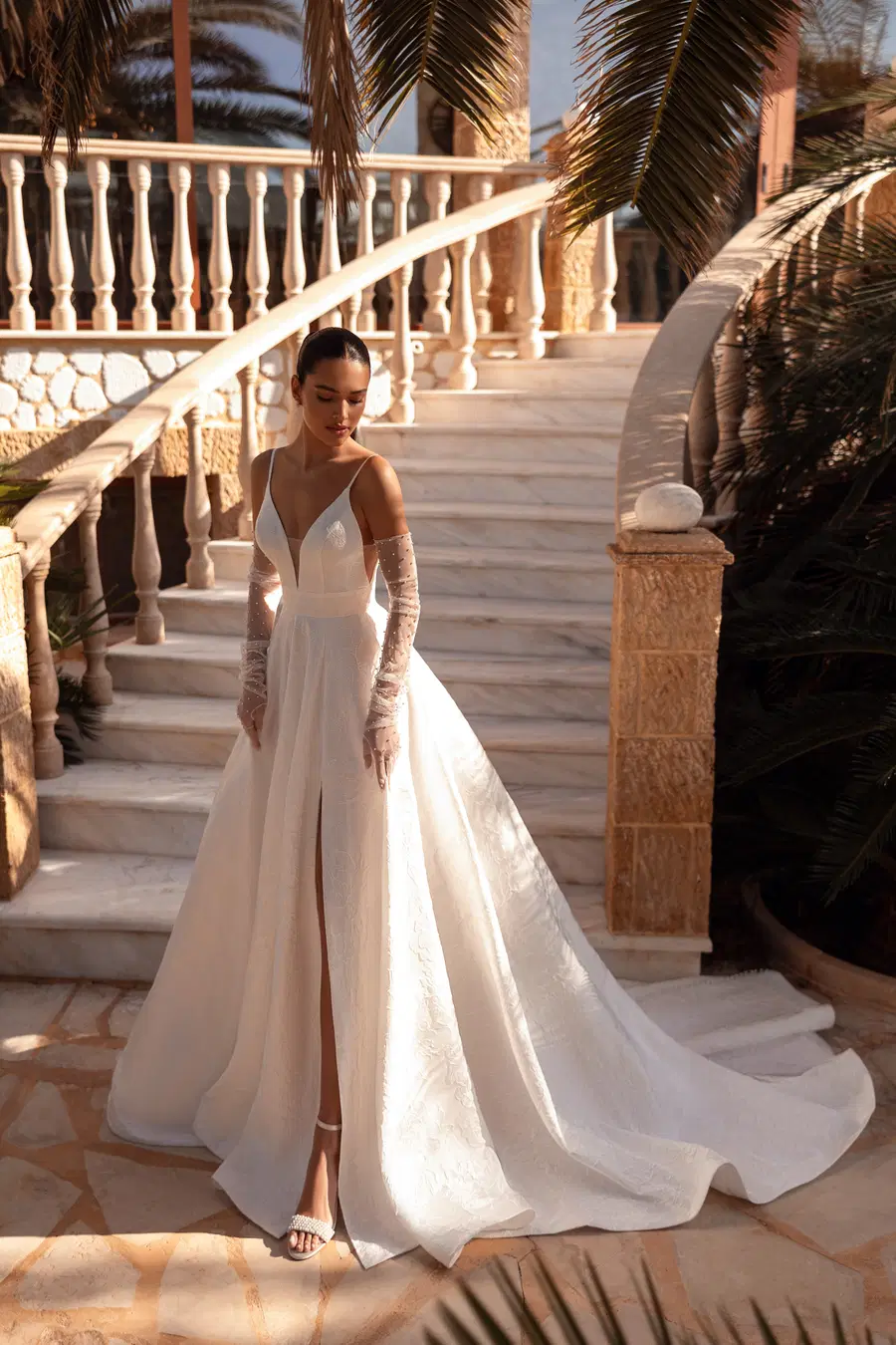 8246 by Demetrios: A-Line silhouette, deep V-neck neckline, separate sleeves, brocade