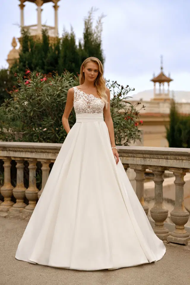 8269 by Monica Loretti: A-Line silhouette, asymetric neckline, sleeveless, lace