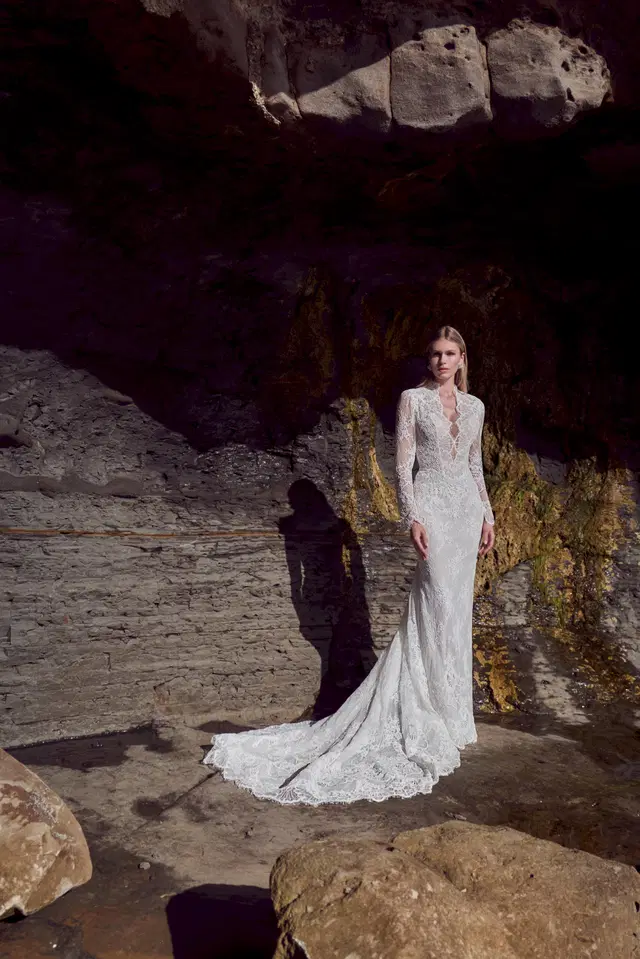 126245 Sarella by Calla Blanche: Trumpet silhouette, deep V-neck neckline, long sleeves, lace