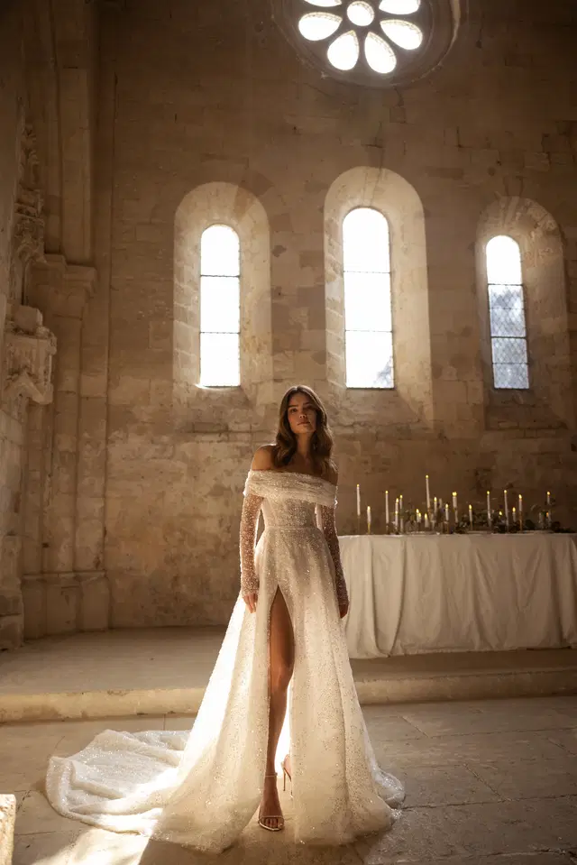 Dita by Eva Lendel: A-Line silhouette, off-shoulder neckline, long sleeves, lace