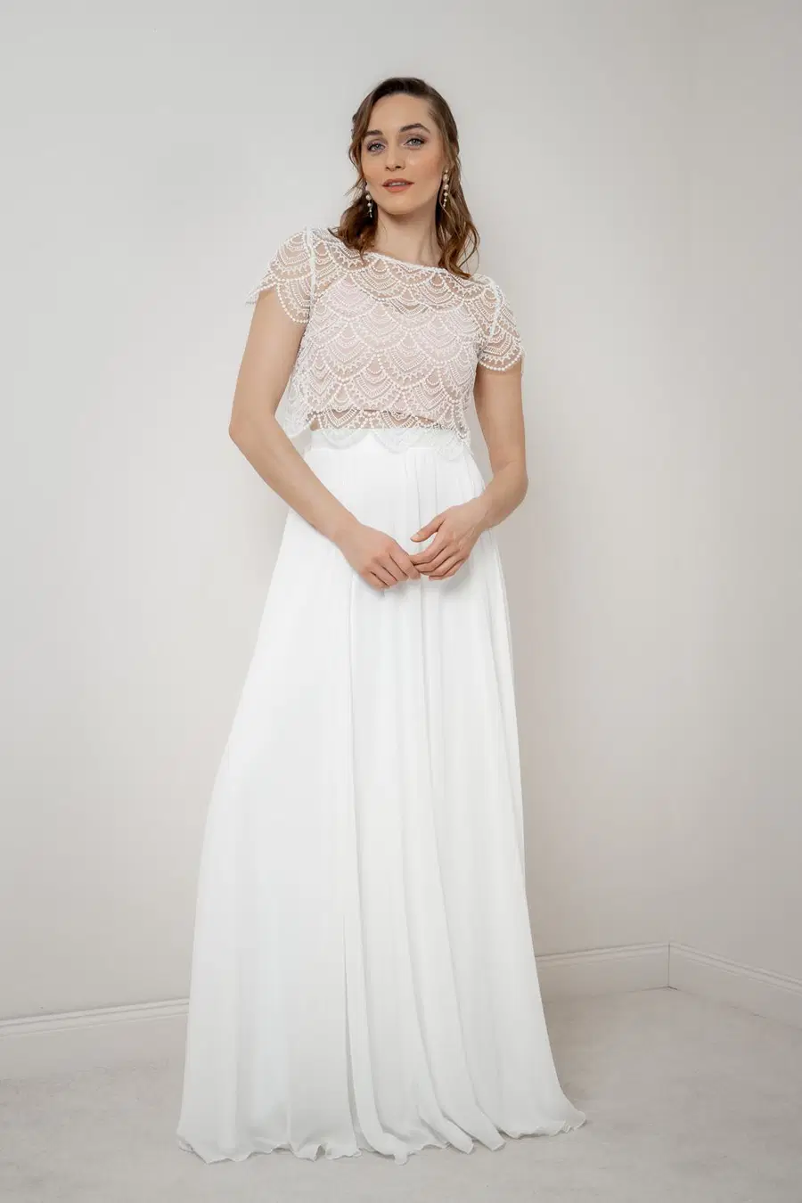 Top Corie Rosé by noni Selected: Two-Piece silhouette, sweetheart neckline, sleeveless, jersey
