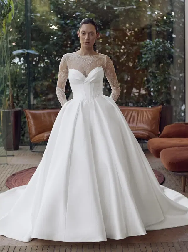 Giovanna by ÉLYSÉE: Ball Gown silhouette, sweetheart neckline, long sleeves, lace