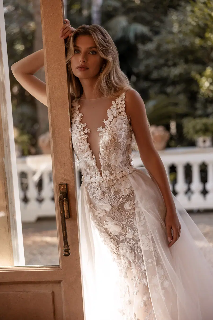 Charlene by Tina Valerdi: Mermaid silhouette, deep V-neck neckline, sleeveless, tulle