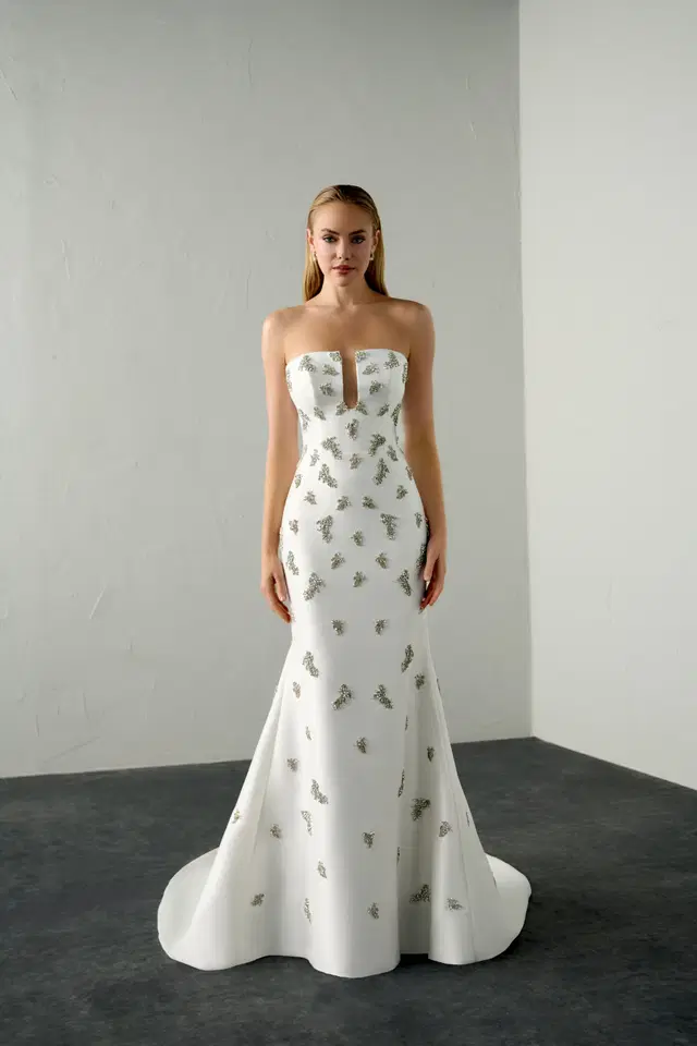 Vice by Justin Alexander Signature: Trumpet silhouette, deep V-neck neckline, sleeveless