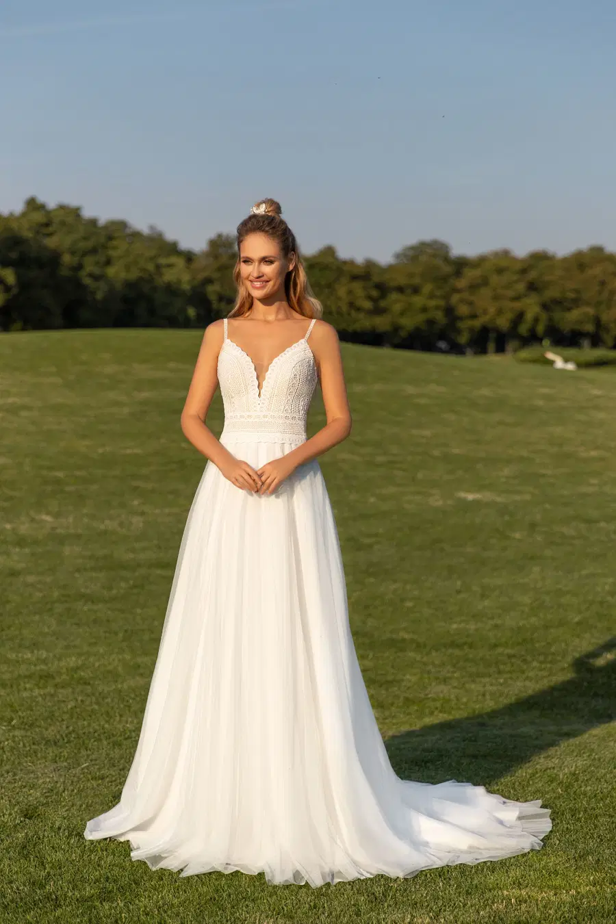 1037 by Angela Bianca: A-Line silhouette, deep V-neck neckline, macrame