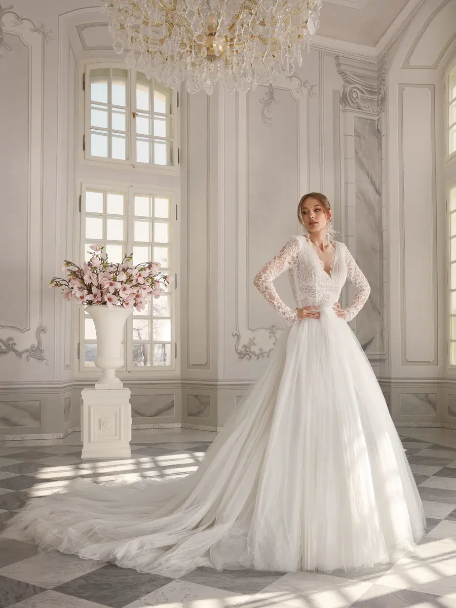 Nina by Vanilla Sposa: Ball Gown silhouette, V-neck neckline, long sleeves, lace