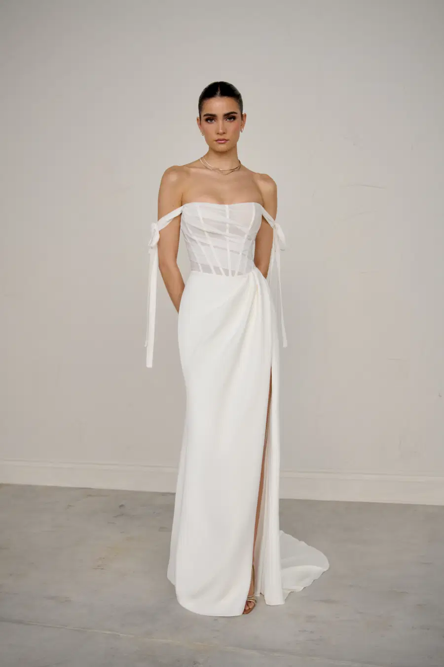 Cadenza by Justin Alexander Signature: Fit & Flare silhouette, cat eye neckline, crepe