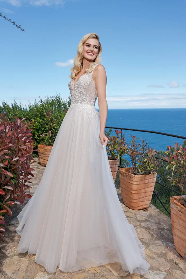 DT304 by Duett: A-Line silhouette, deep V-neck neckline, sleeveless, tulle