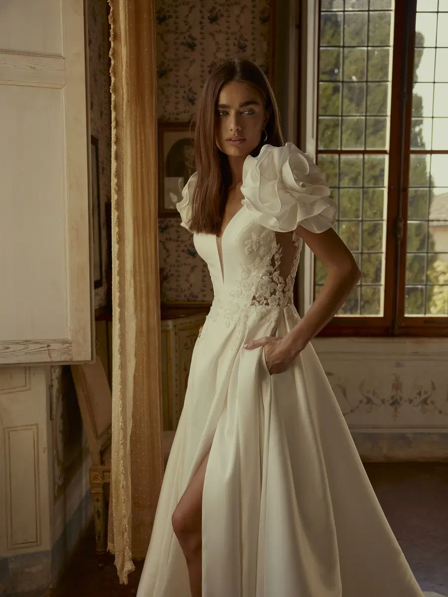 Dottie by Modeca Bridal: Ball Gown silhouette, V-neck neckline, separate sleeves, lace