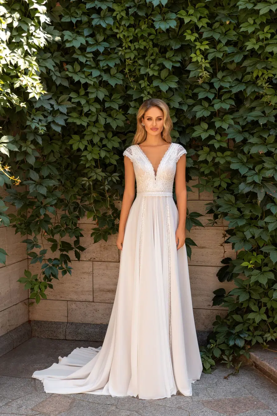 1055 by Angela Bianca: A-Line silhouette, deep V-neck neckline, cap sleeves, chiffon