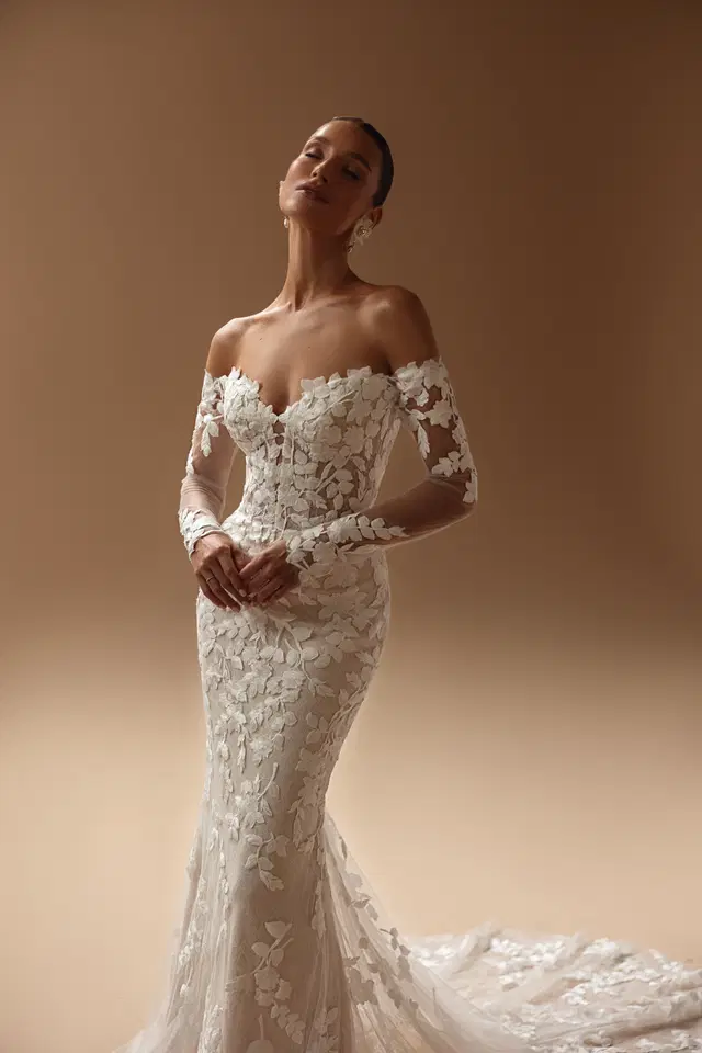 Dania by Ella Novia: Trumpet silhouette, sweetheart neckline, long sleeves, lace