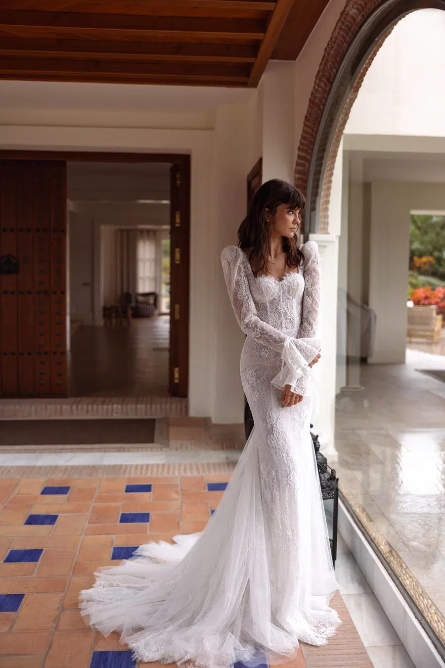 Vionne by Tina Valerdi: Mermaid silhouette, sweetheart neckline, long sleeves, lace