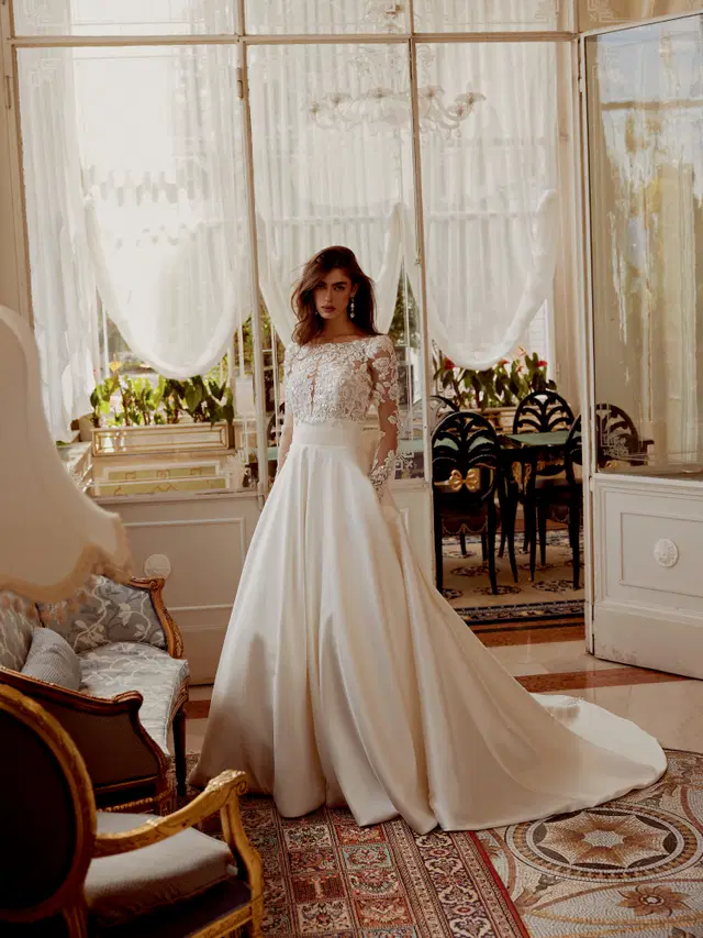 Iselin by Justin Alexander: A-Line silhouette, illusion neckline, long sleeves, mikado