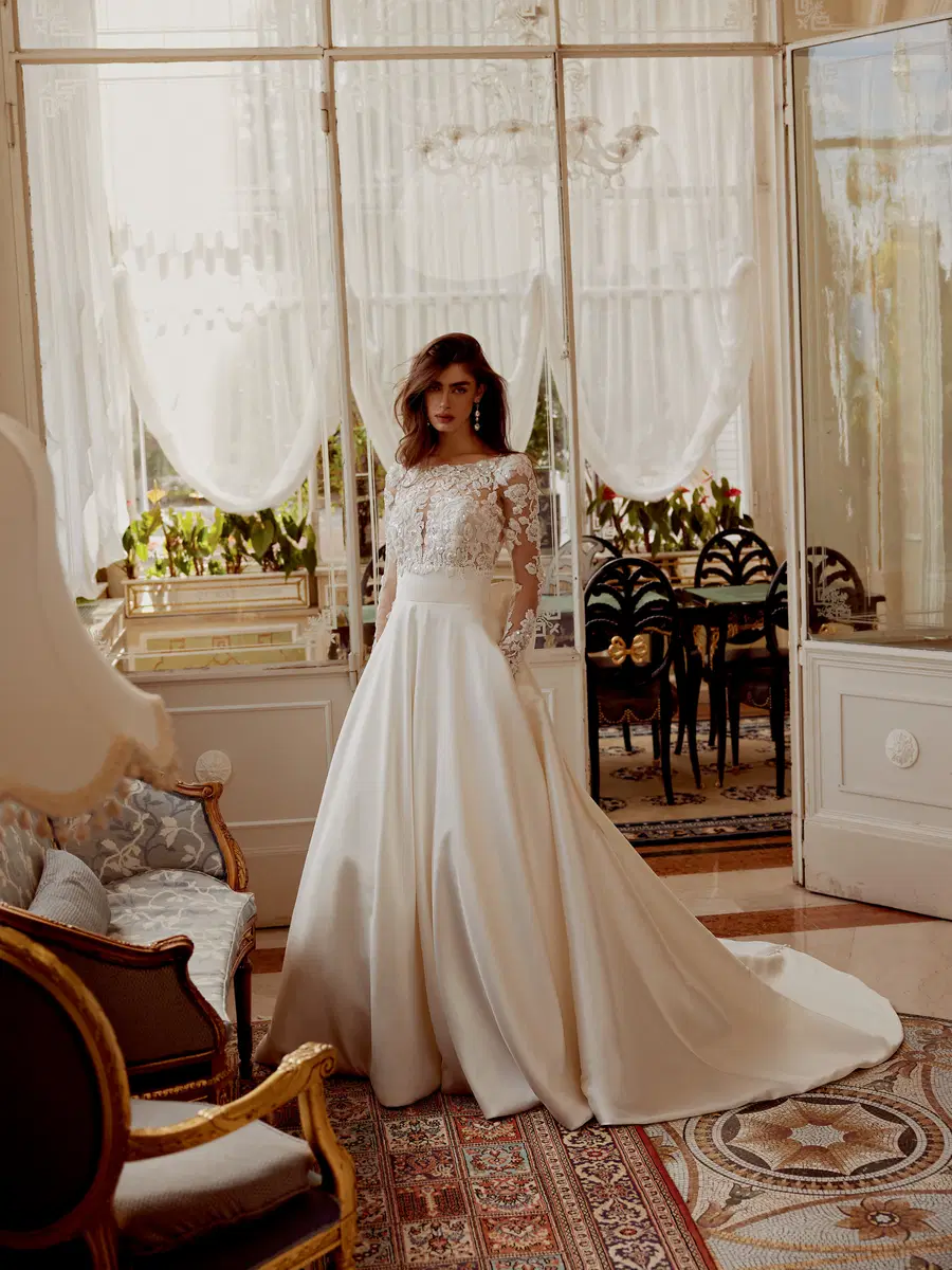 Iselin by Justin Alexander: A-Line silhouette, illusion neckline, long sleeves, mikado
