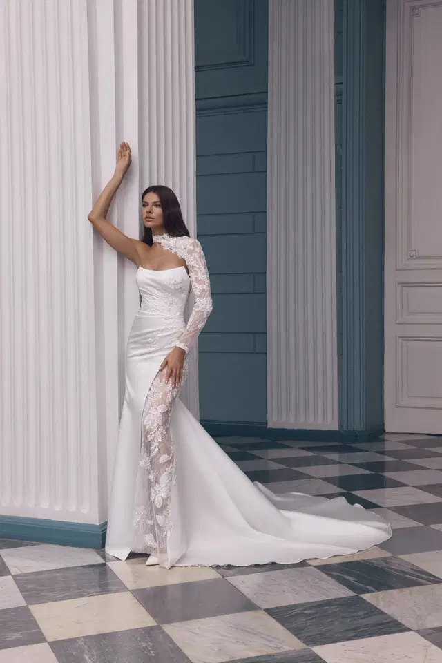 Olympe by Carfelli: Trumpet silhouette, asymetric neckline, long sleeves, lace
