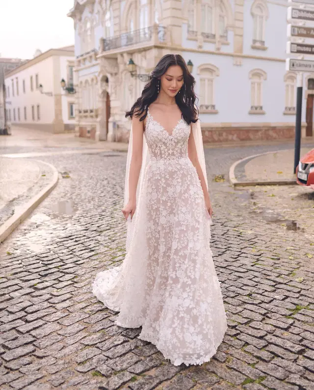 Ladonna by Maggie Sottero: Fit & Flare silhouette, deep V-neck neckline, sleeveless, lace