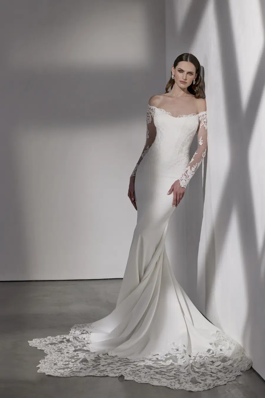 Berkeley by Avenue by Josephine Scott: Trumpet silhouette, off-shoulder neckline, long sleeves, crepe