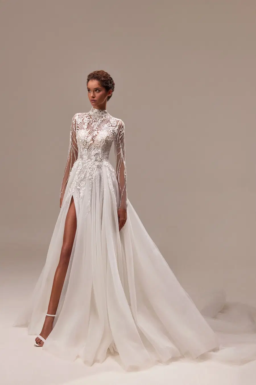 Cassidy by Milla Nova: A-Line silhouette, high / halter neckline, long sleeves, lace