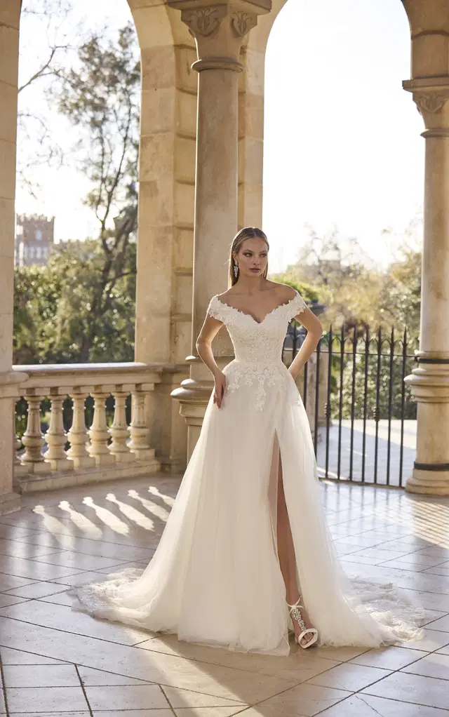 Hymira by Veni Infantino: A-Line silhouette, off-shoulder neckline, cap sleeves, lace