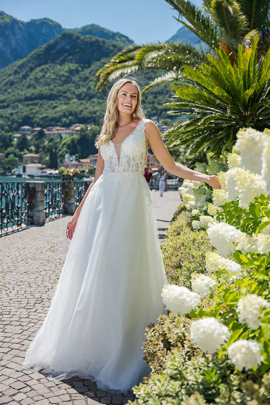 VN11 ivory by Vera Nova: A-Line silhouette, V-neck neckline, cathedral train