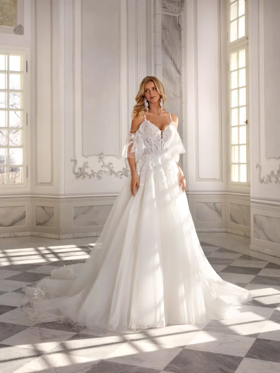 Kenzie by Vanilla Sposa: Ball Gown silhouette, deep V-neck neckline, lace, chapel train