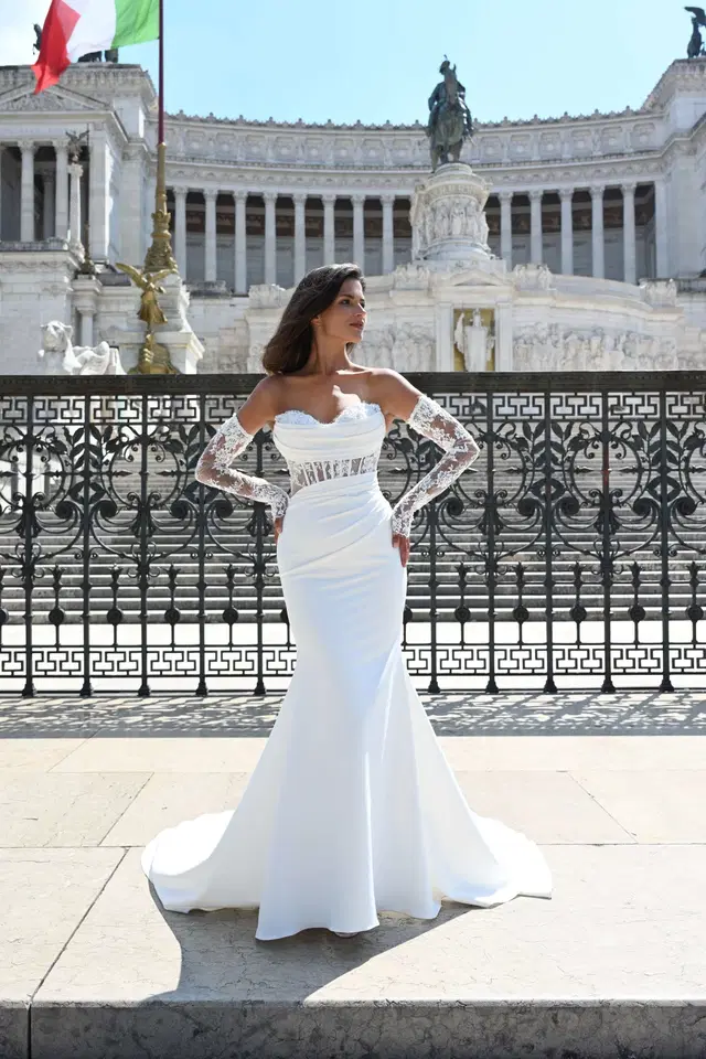 Navona by Dando London: Fit & Flare silhouette, illusion neckline, sleeveless, crepe