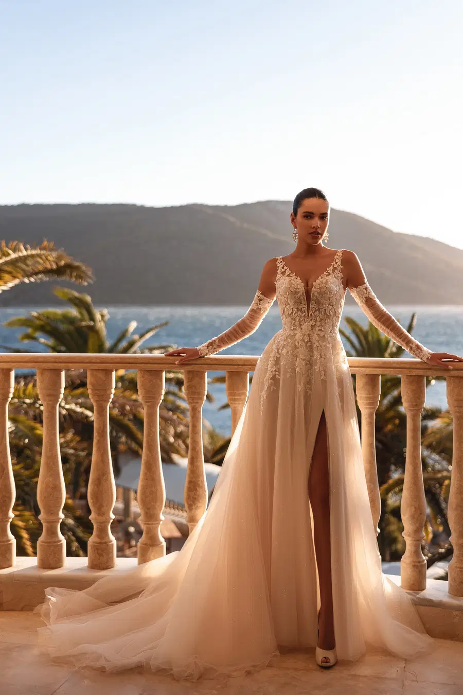 8279 by Demetrios: A-Line silhouette, deep V-neck neckline, sleeveless, lace