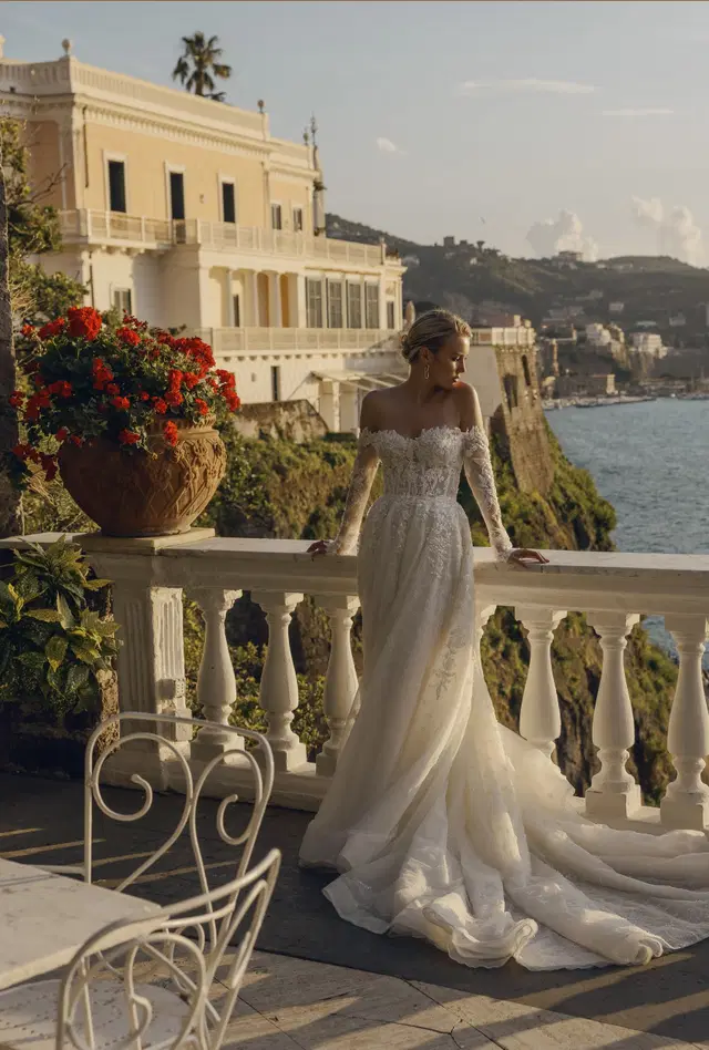 Calvino 24-015 by Ricca Sposa: Ball Gown silhouette, off-shoulder neckline, long sleeves, embroidery