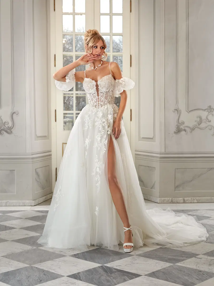 Kaia by Vanilla Sposa: A-Line silhouette, deep V-neck neckline, lace, chapel train