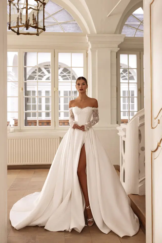 Sybil by Tina Valerdi: Princess silhouette, sweetheart neckline, long sleeves, lace