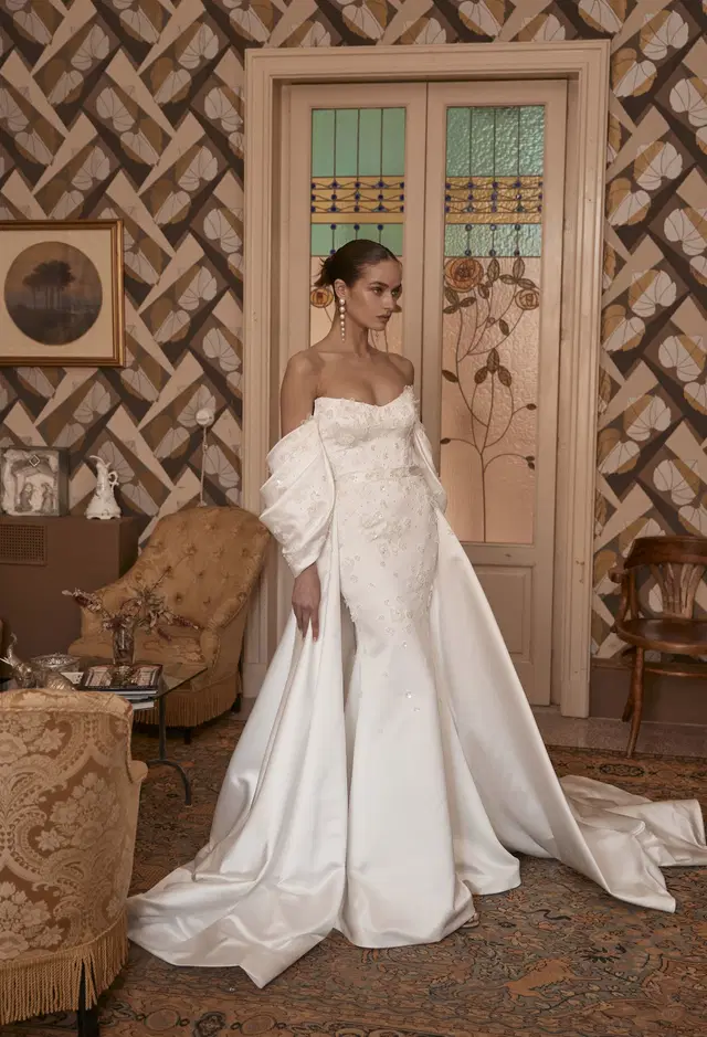 Euphemia 25-004 by Ricca Sposa Atelier: Mermaid silhouette, sweetheart neckline, detachable sleeves, satin