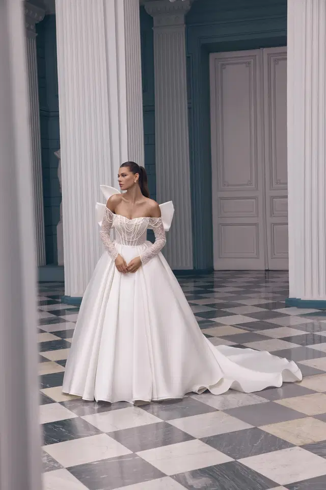Julietta by Carfelli: Ball Gown silhouette, sweetheart neckline, long sleeves, lace