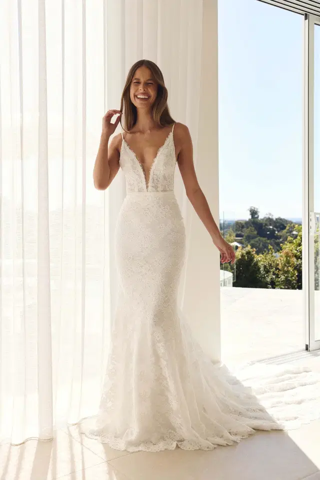 Zak by MWL Bride: Trumpet silhouette, deep V-neck neckline, sleeveless, lace
