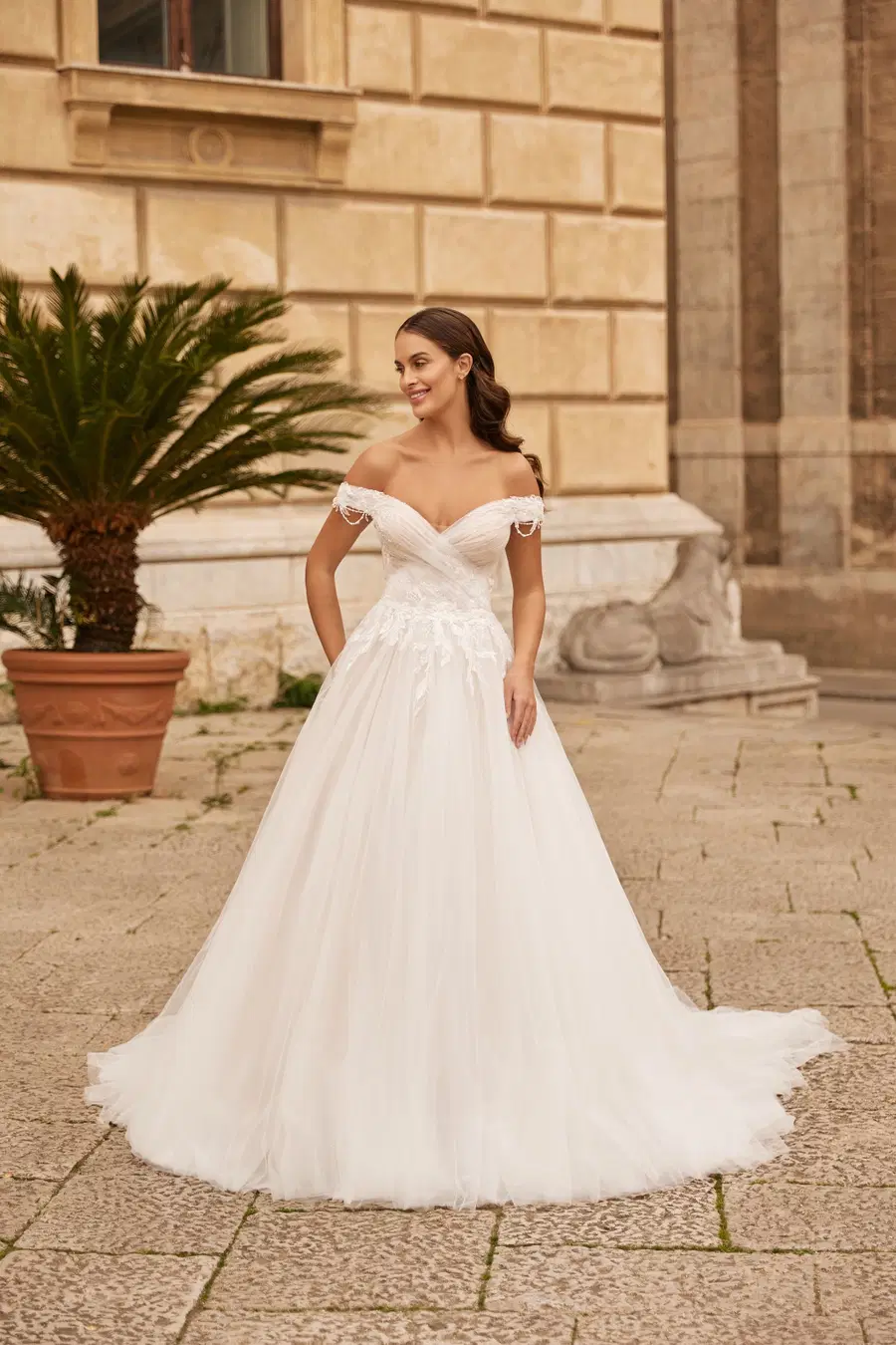 8330 by Monica Loretti: Ball Gown silhouette, off-shoulder neckline, lace