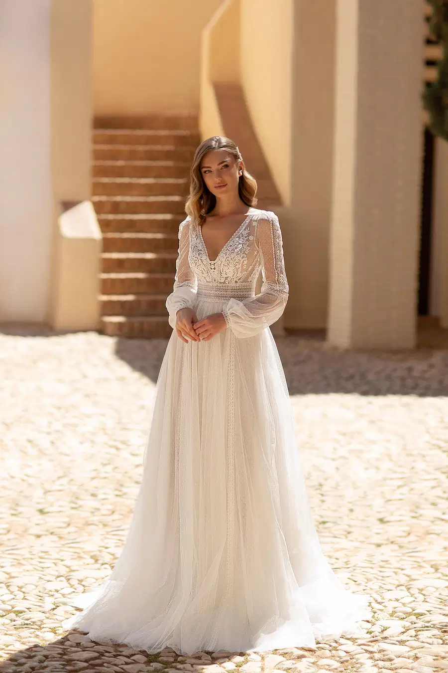 8244 by Monica Loretti: A-Line silhouette, V-neck neckline, long sleeves, tulle