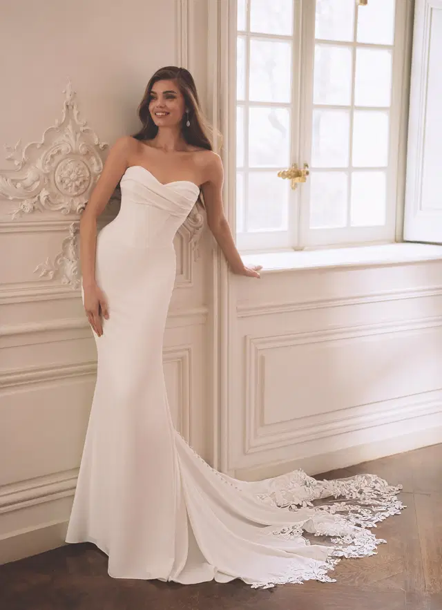 Finley by ÉLYSÉE: Fit & Flare silhouette, semi sweetheart neckline, lace, chapel train