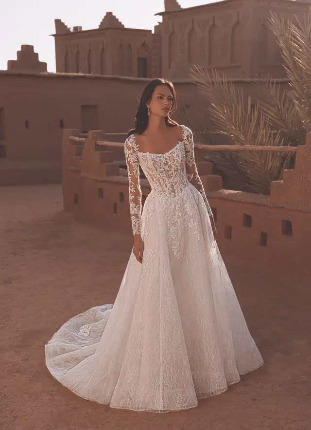 Tabitha by Enzoani: A-Line silhouette, scoop neckline, long sleeves, lace