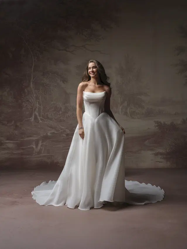 ABILENE by Maggie Sottero: A-Line silhouette, cat eye neckline, cap sleeves, organza