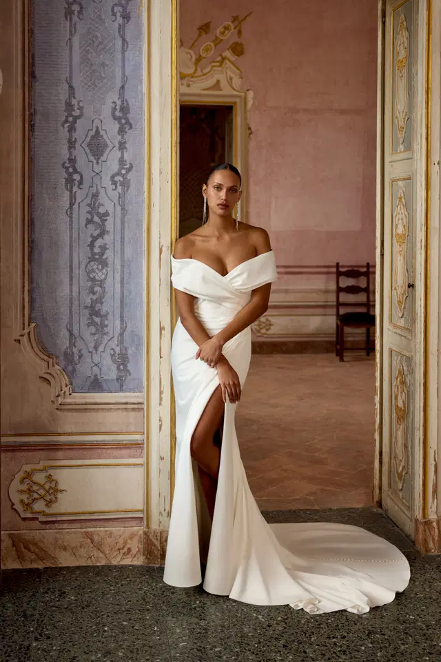 Kori by Justin Alexander: Fit & Flare silhouette, off-shoulder neckline, crepe