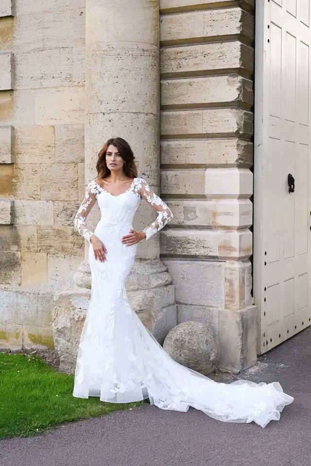Camber by Dando London: Fit & Flare silhouette, straight neckline, long sleeves, lace
