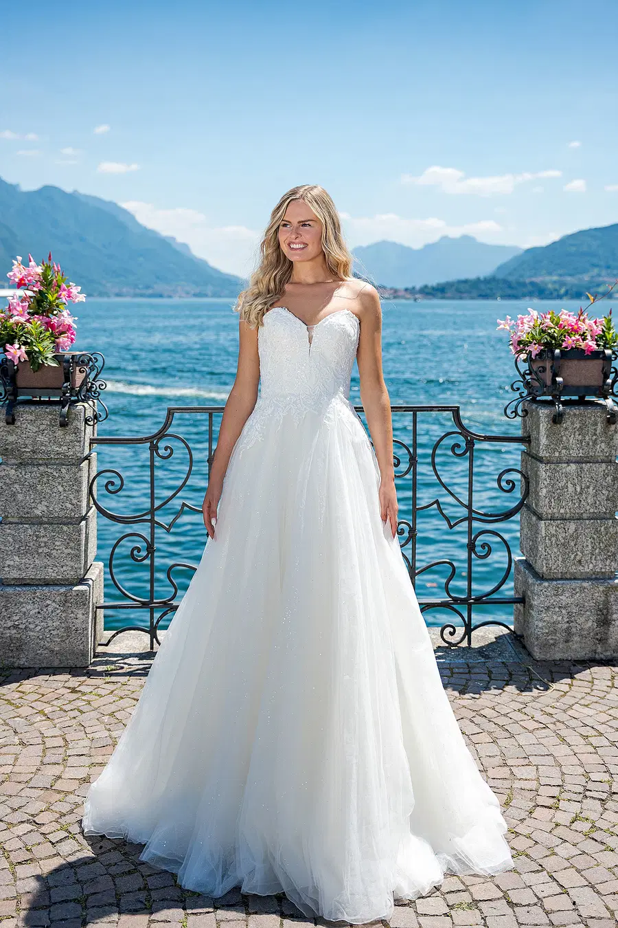 VN15 ivory by Vera Nova: sweetheart neckline, tulle, cathedral train